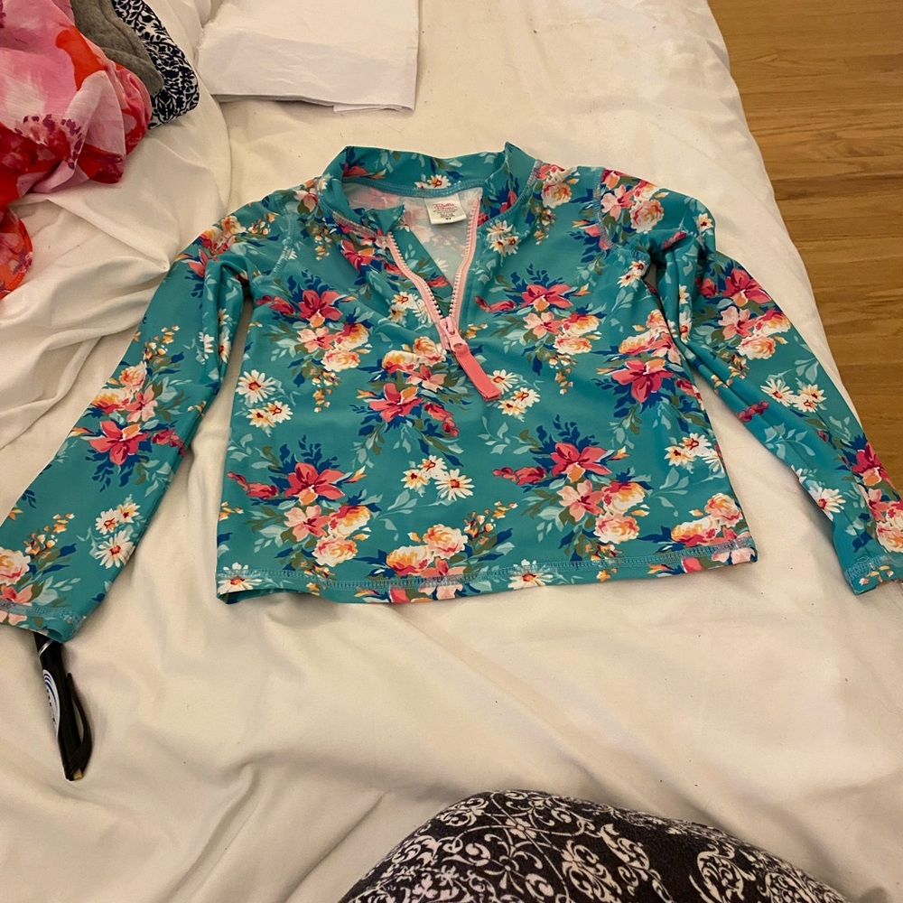 NWOT ruffle butts brand swim shirt. Size 4t